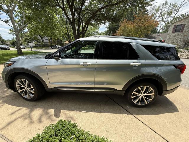 2025 Ford Explorer SUV in a driveway after exterior detail, showing polished paint and clean factory wheels